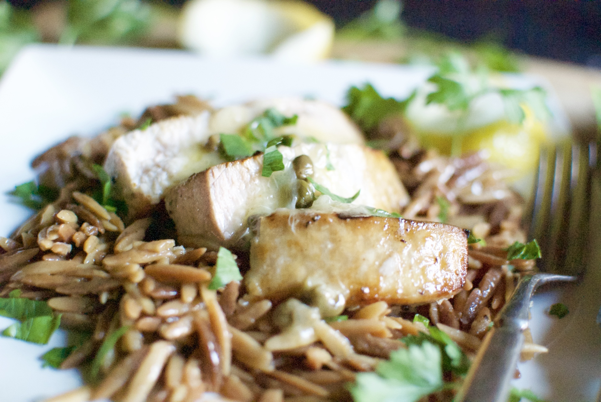 Grilled swordfish with butter, lemon & caper sauce