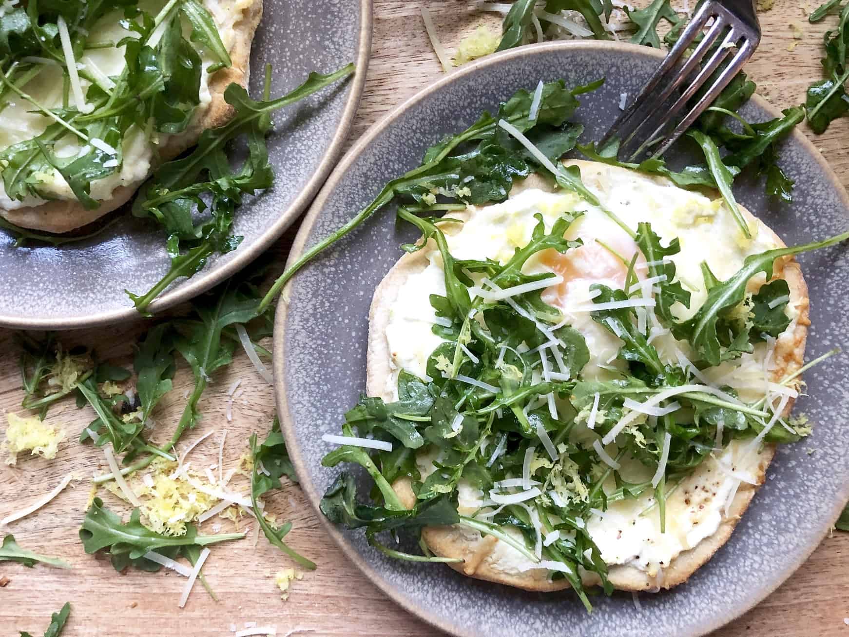 Mini breakfast pizzas with arugula salad