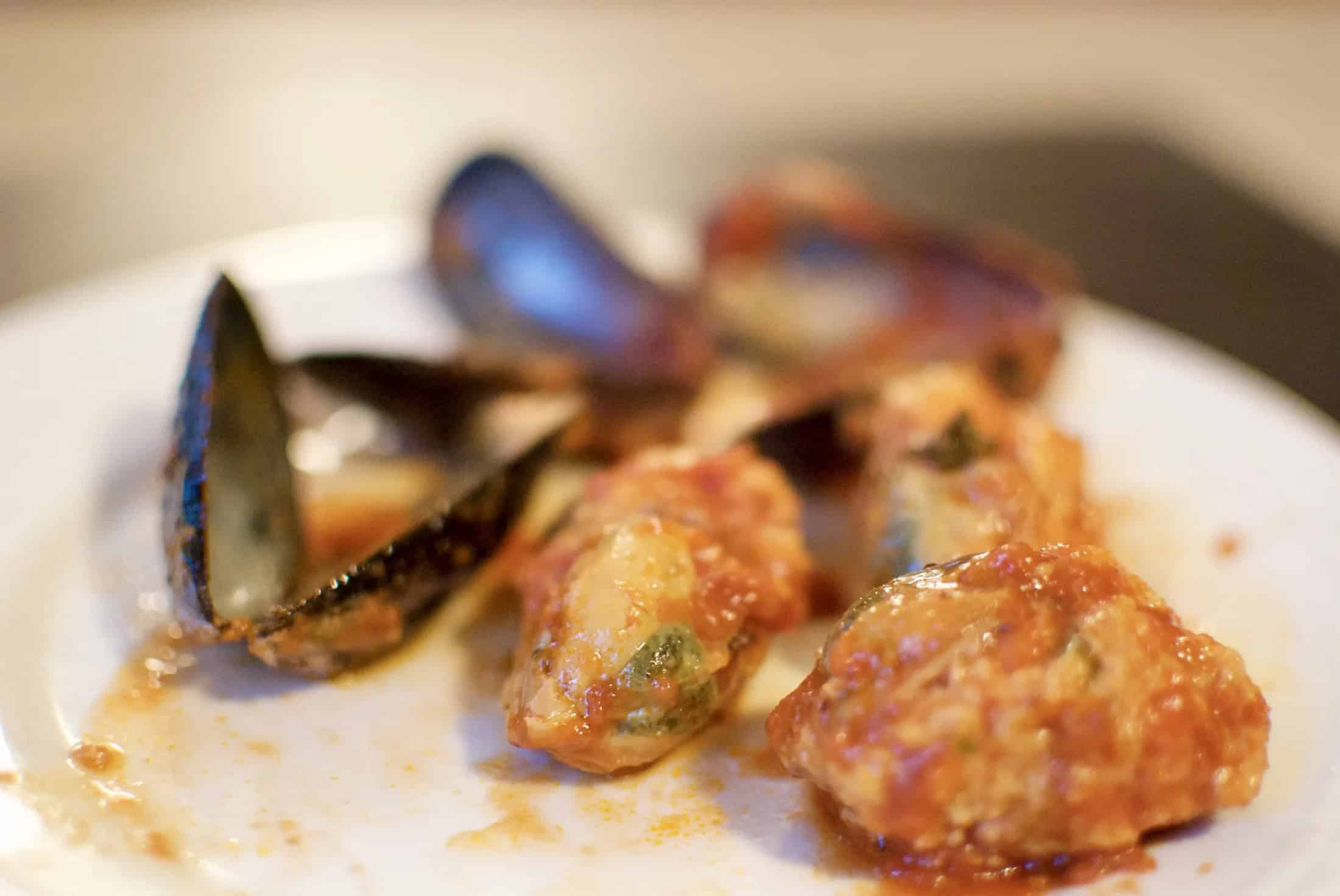 Homemade stuffed mussels marinara