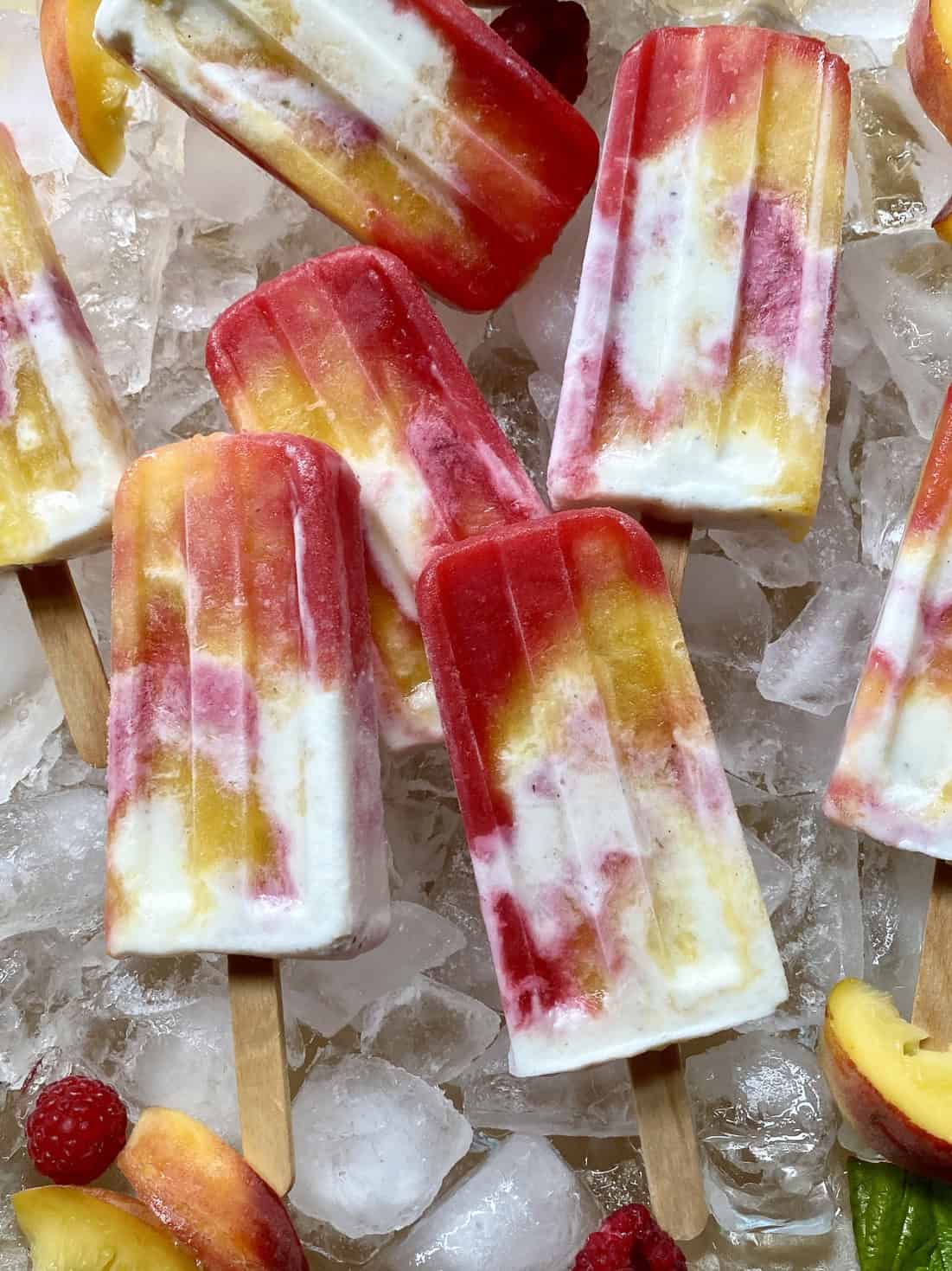 Homemade peach melba popsicles