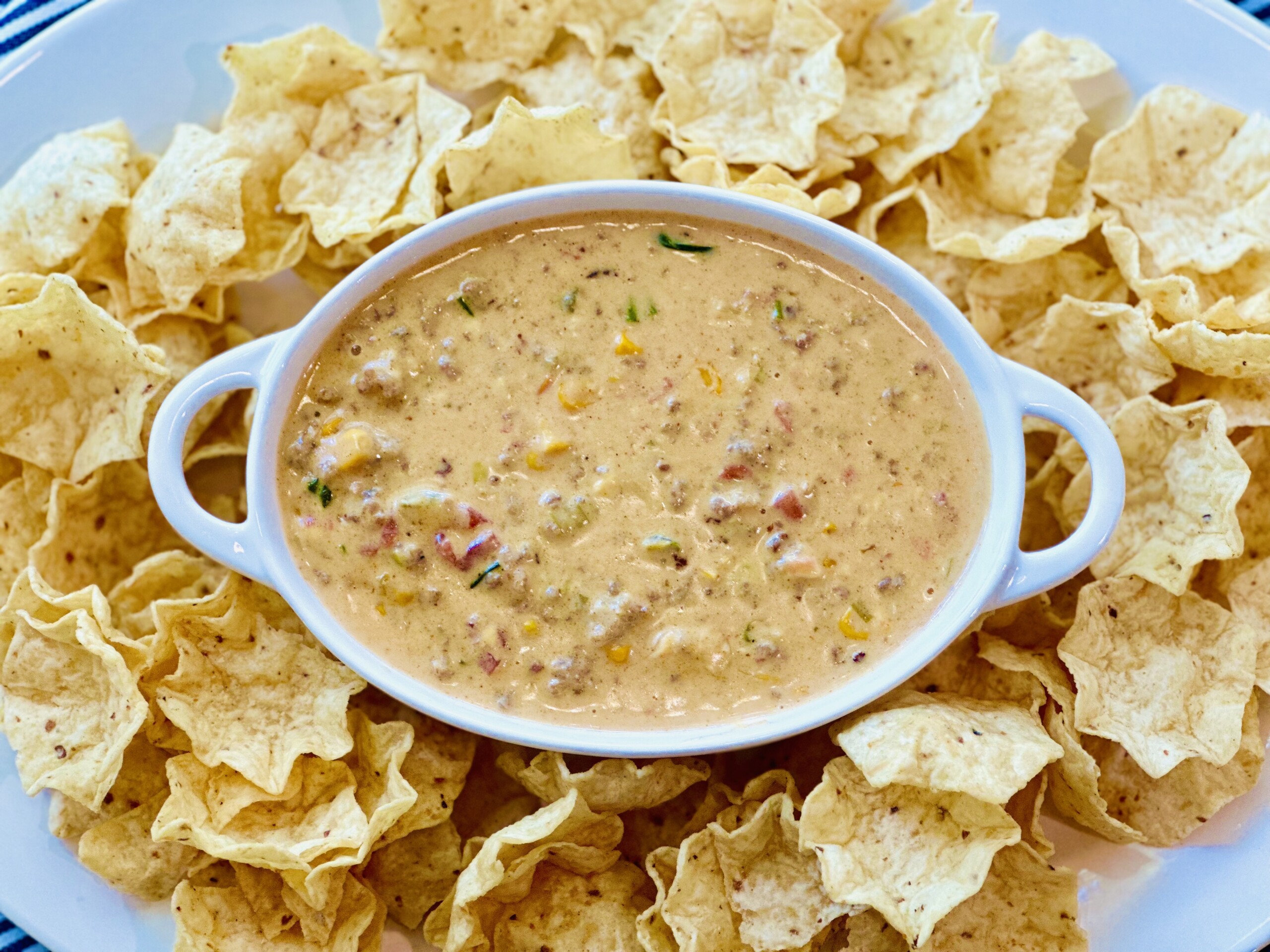 Spicy Sausage and Corn Queso Dip