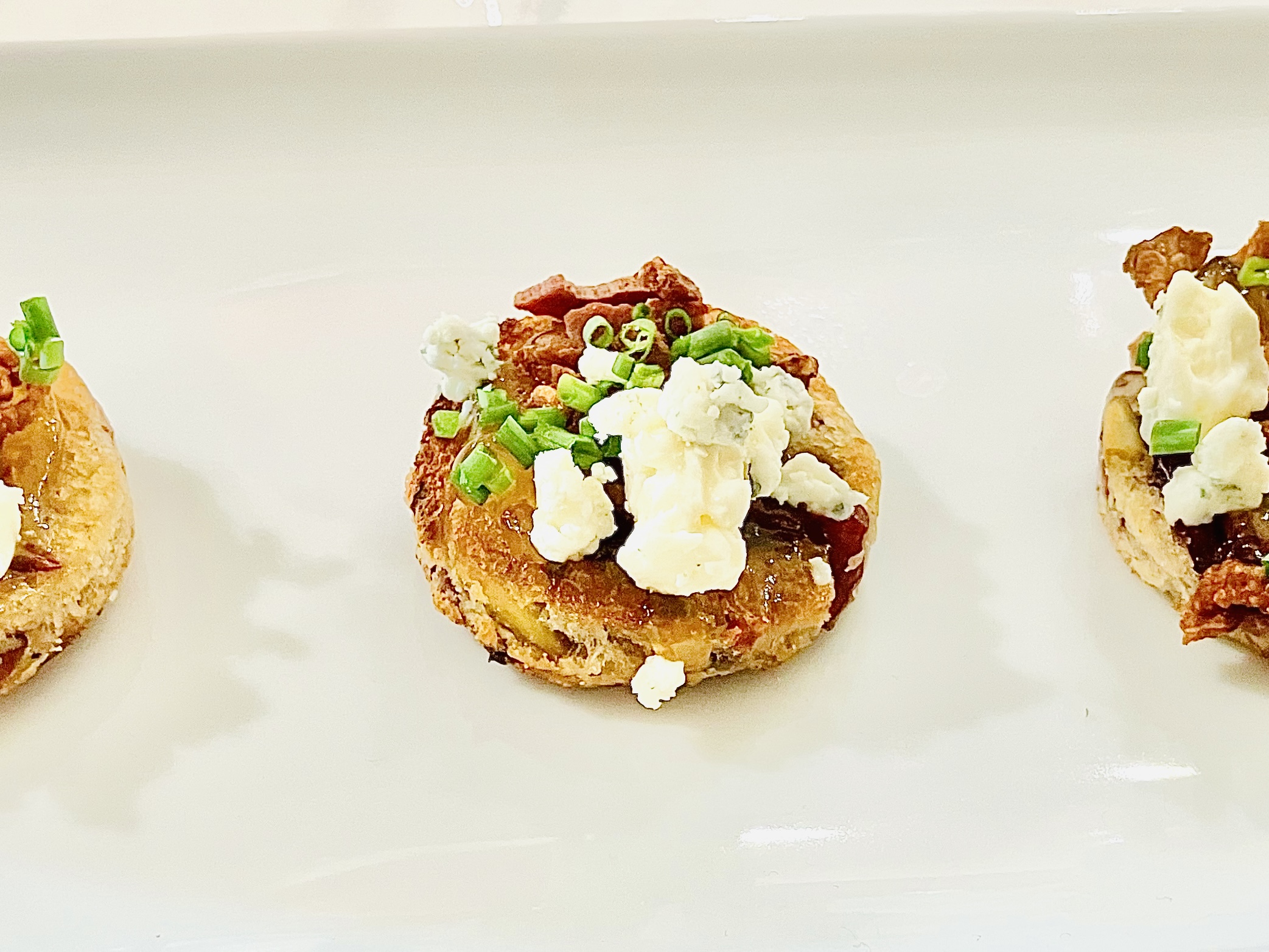 Cranberry-Pistachio Crostini with Fig Jam, Bacon, Bleu Cheese & Chives