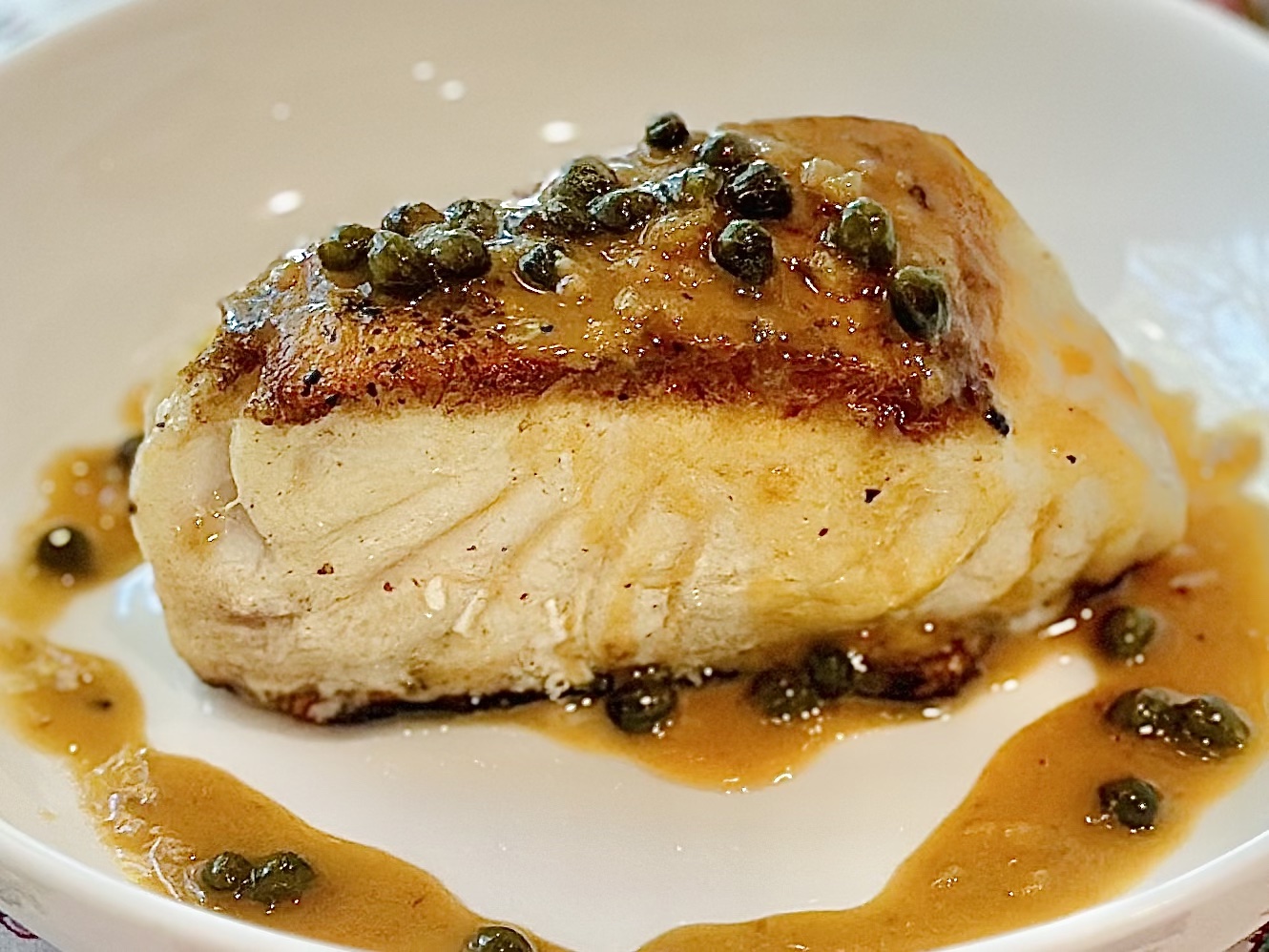 Seared Chilean Sea Bass with Lemon Butter Caper Sauce