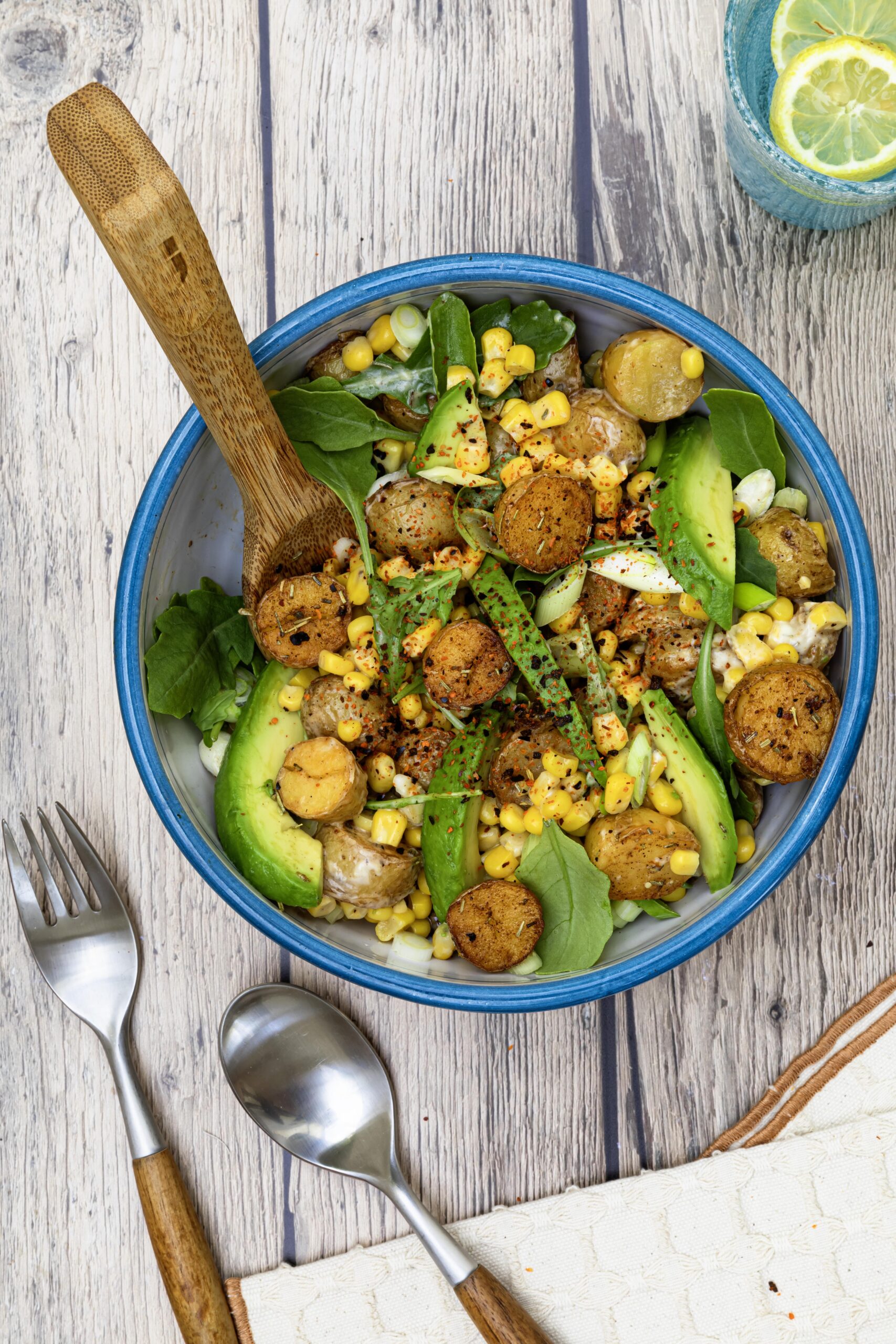 Corn salad with fried potato and avocado